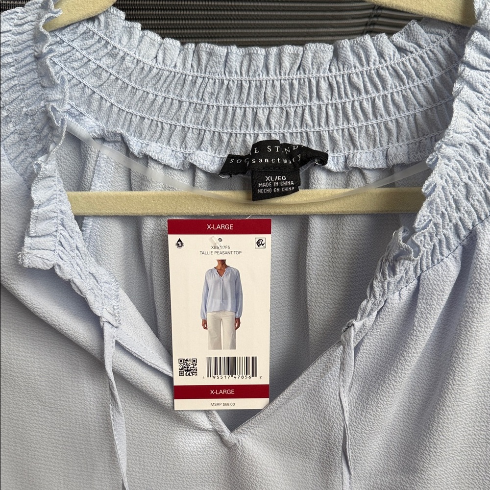 Elegant Light Blue Smocked Neck Blouse - Picture 2 of 15